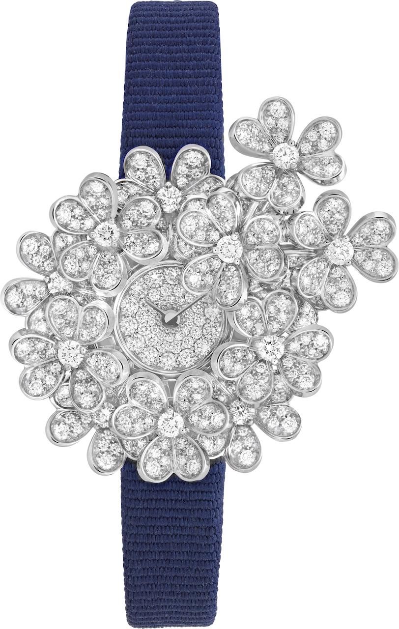 Frivole Secrète watch. 33 mm white gold case; 10 mm white gold dial, round diamonds; white gold flowers, round diamonds; navy grosgrain bracelet; white gold pin buckle, round diamonds; white gold clip, round diamonds; white gold chain; DEF, IF to VVS diamonds; quartz movement.