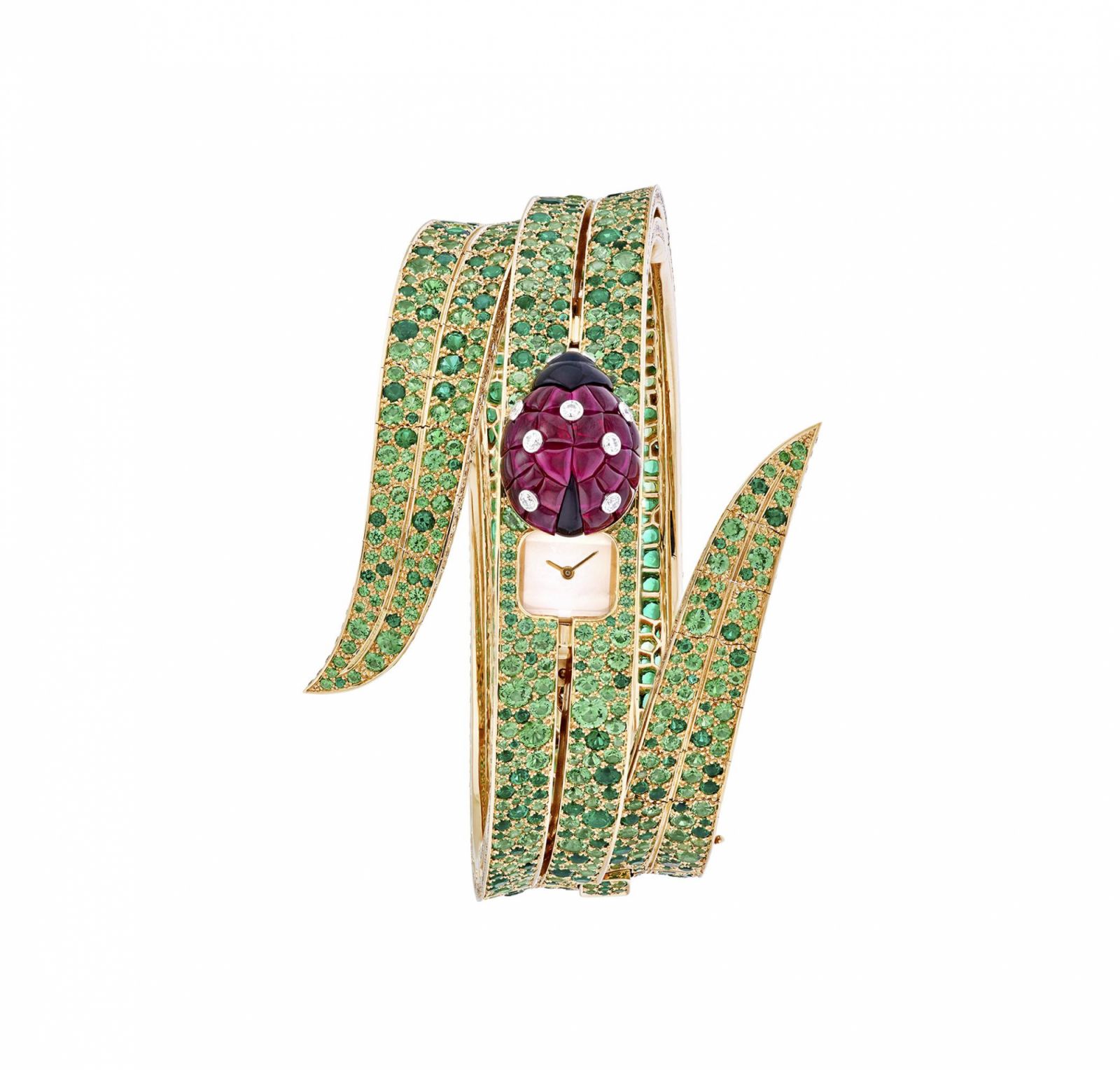 Secret de Coccinelle watch. 18K yellow gold case; 9 x 20 mm brass dial painted white; 16 x 12 x 8 mm 18K rose gold and rhodium plated 18K white gold ladybug, Traditional Mystery Set buff-topped rubies, round diamonds, onyx; 18K yellow gold bracelet, round emeralds, round tsavorite garnets; 18K yellow gold clasp; diamond quality DE, IF to VVS; manual-winding mechanical movement (JLC); unique piece