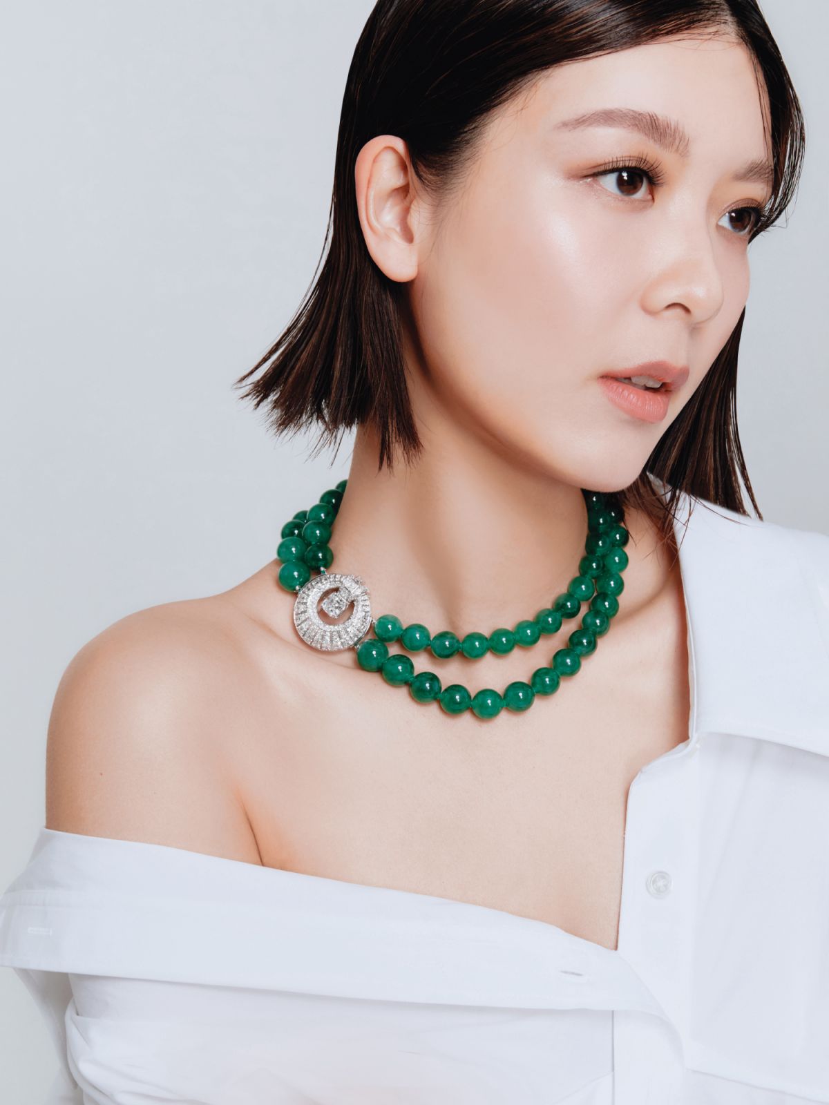 Jennifer Yu wears two-strand jadeite and diamond necklace, clasp signed by Cartier (to be auctioned on May 10 and 12 at Christie’s Geneva) and Alexander Wang shirt, available at Lane Crawford (Photo: Reuben Foong/Tatler Hong Kong)