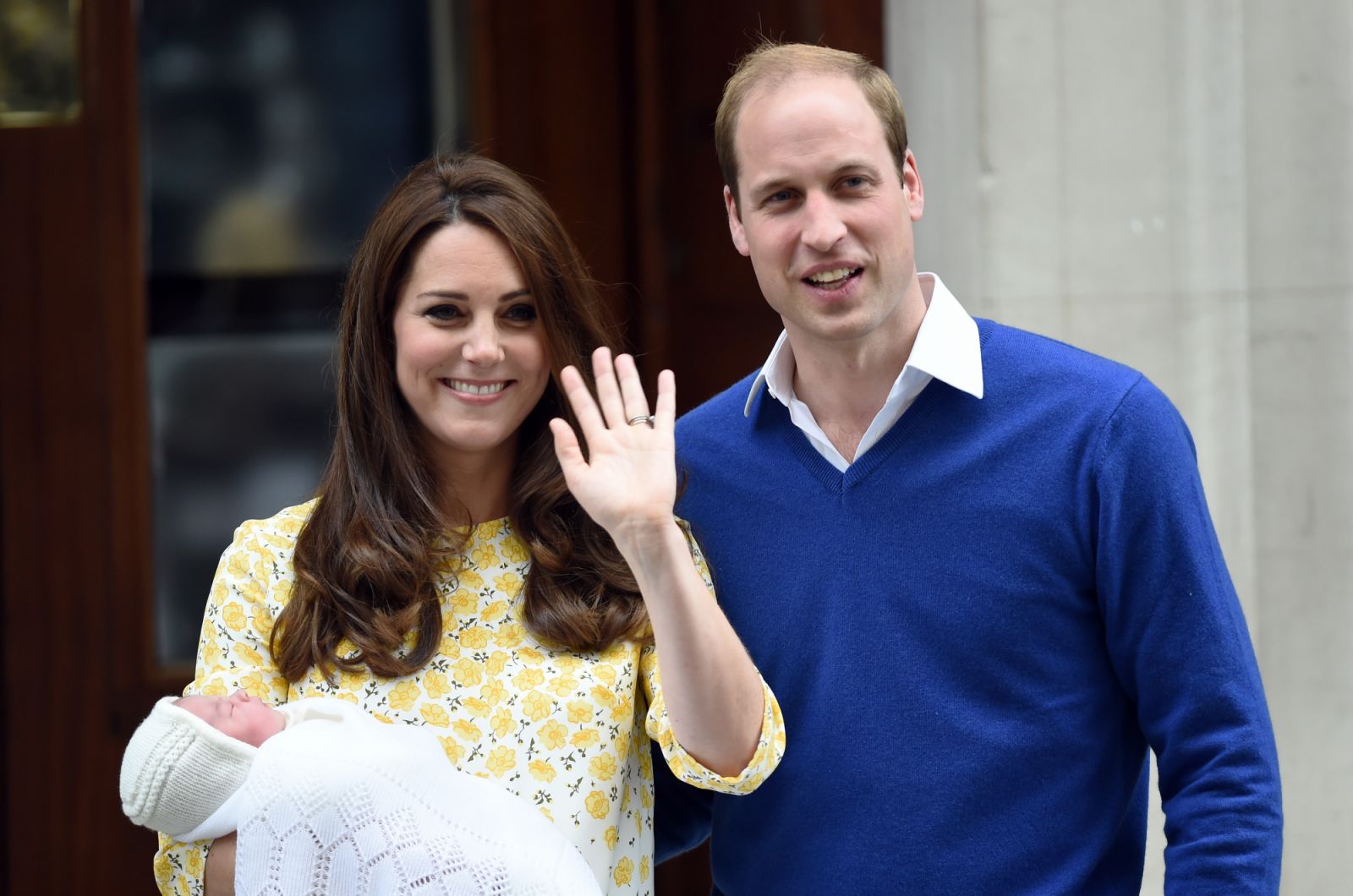 LONDON, ENGLAND - MAY 02:  Catherine Duchess of Cambridge, wearing a Jenny Packham dress, and Prince William, Duke of Cambridge leave the Lindo Wing at St. Mary's Hospital  with their new born baby daughter on May 02, 2015 in London, England.  The Duchess of Cambridge was safely delivered of a daughter at 8:34am this morning weighing 8lbs 3oz. (Photo by Anwar Hussein/WireImage)