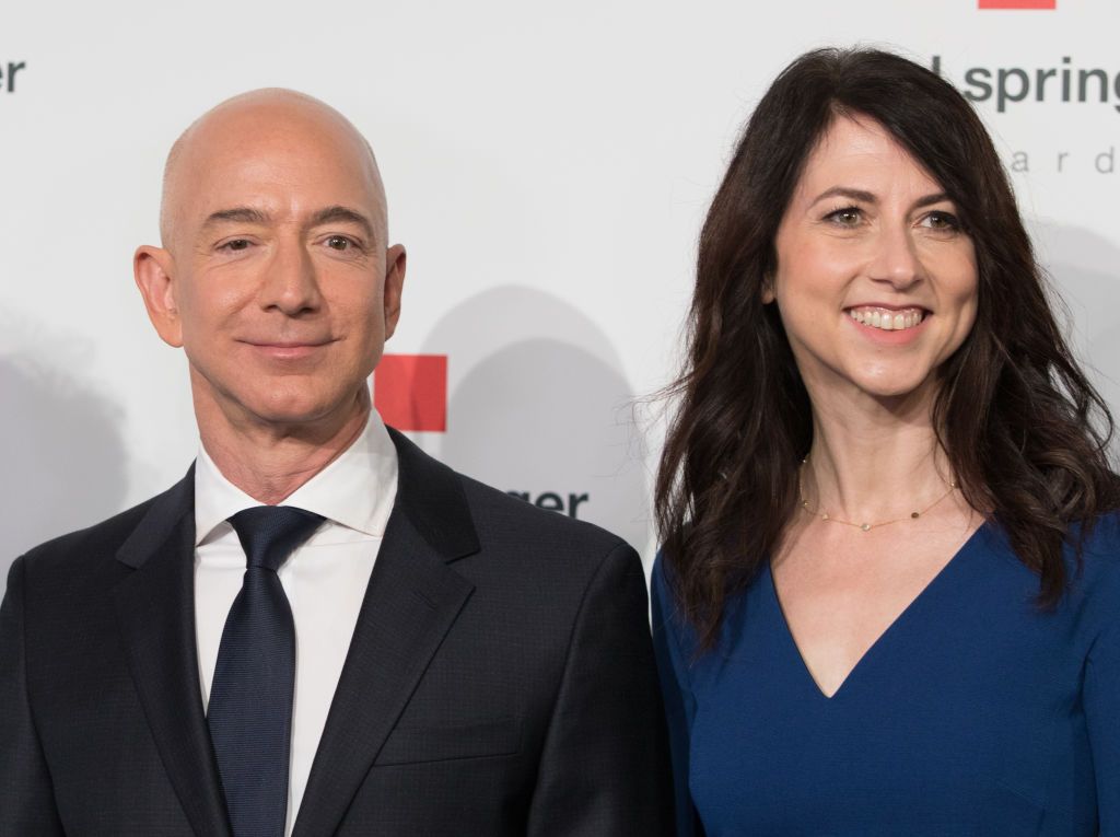 24 April 2018, Germany, Berlin: Head of Amazon Jeff Bezos and his wife MacKenzie Bezos arrive for the Axel Springer award ceremony. Bezos will be receiving the award later. Photo: Jörg Carstensen/dpa (Photo by Jörg Carstensen/picture alliance via Getty Images)