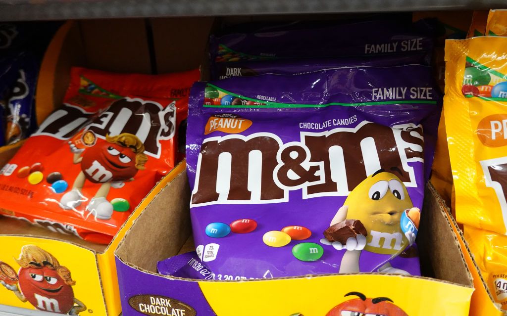 MIAMI, FLORIDA - JANUARY 24: Packages of M&M's for sale are seen in a store on January 24, 2023 in Miami, Florida. M&M's announced that its multi-colored cast of candy cartoon spokespeople will be retiring effective immediately, and will be replaced by comedian and Saturday Night Live alum Maya Rudolph. (Photo by Joe Raedle/Getty Images)