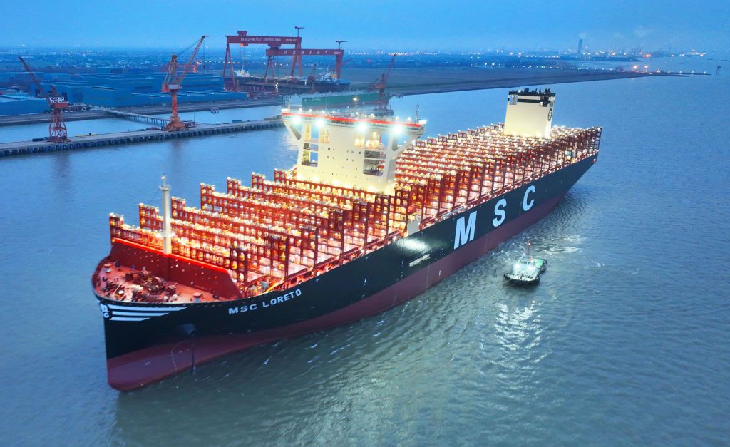 TAICANG, CHINA - MARCH 19: World's largest containership 'MSC Loreto' sets sail for sea trial from a shipyard of Jiangsu Yangzi-Mitsui Shipbuilding Co., Ltd on March 19, 2023 in Taicang, Suzhou City, Jiangsu Province of China. With a total length of 399.99 meters, a width of 61.3 meters and a maximum height of 78.1 meters above the keel, 'MSC Loreto' has a deck area of 24,000 square meters, and it can load 24,346 standard 20-foot containers at a time. (Photo by VCG/VCG via Getty Images)