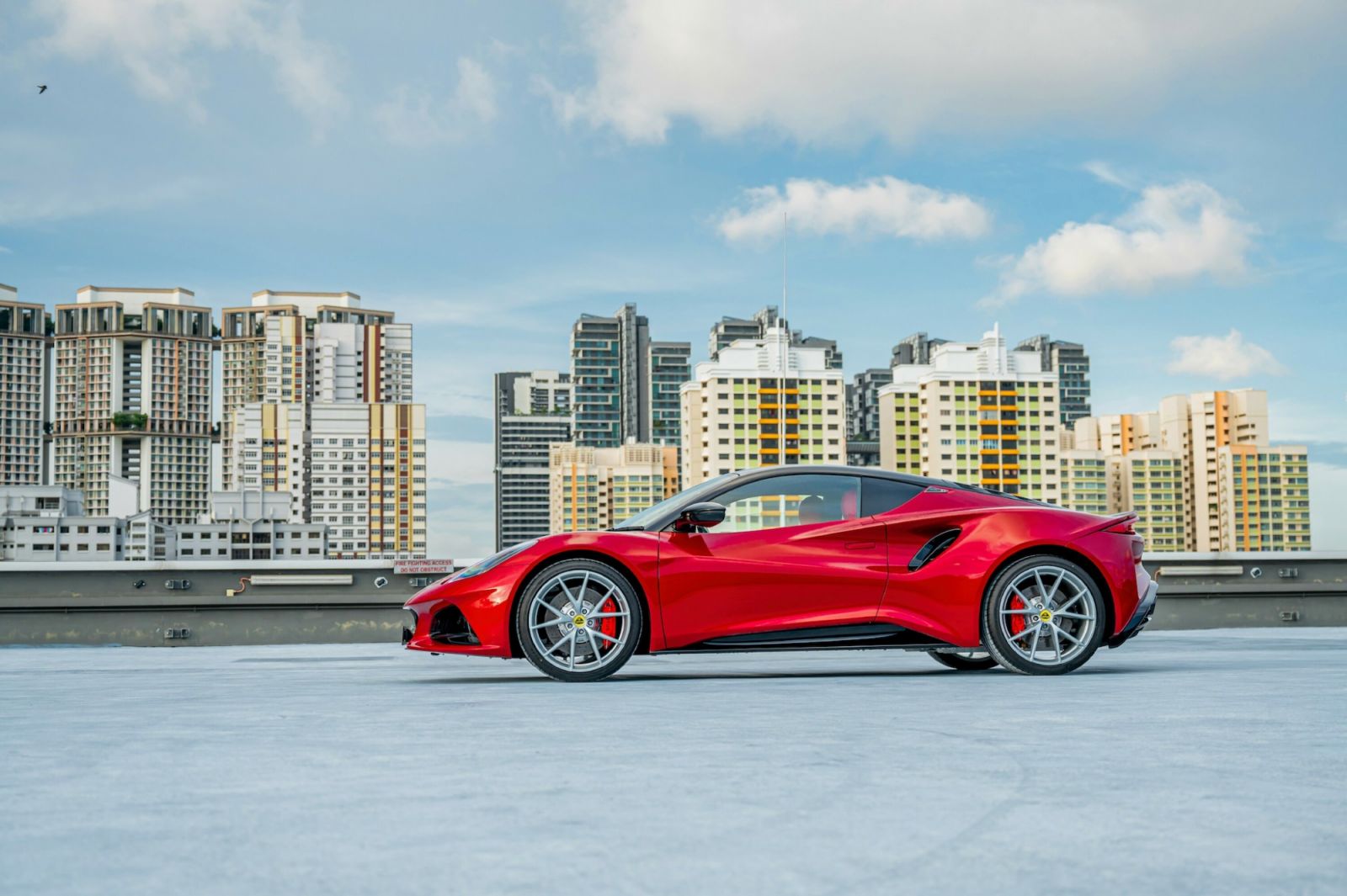 Lotus Emira in Magma Red 2023 supercar review 2023
