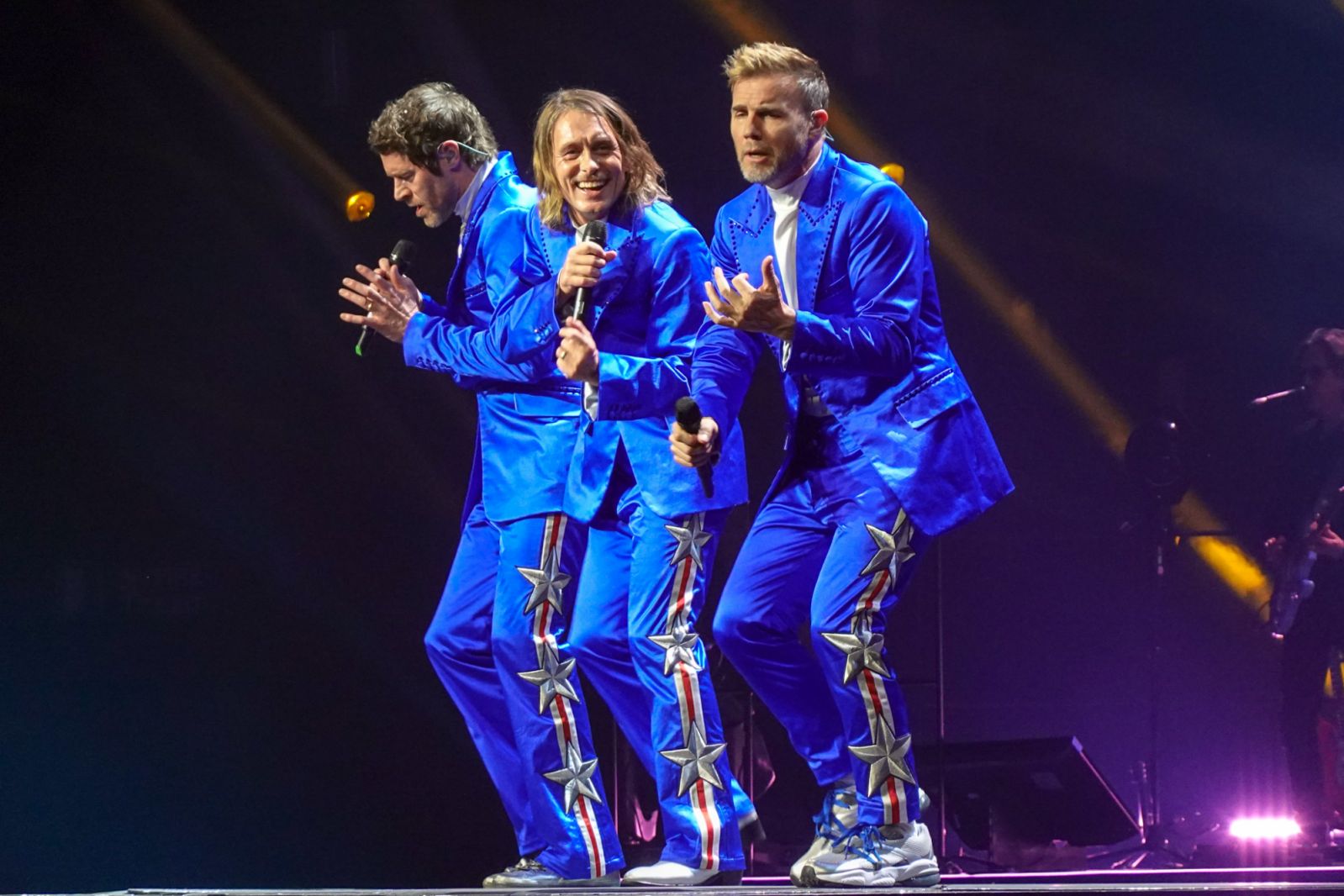Gary Barlow, Howard Donald and Mark Owen of British pop band, Take That, perform at the Sheffield Arena on the opening night of their UK tour 2019 Pictured: Gary Barlow,Howard Donald and Mark Owen Ref: SPL5079715 130419 NON-EXCLUSIVE Picture by: SplashNews.com Splash News and Pictures Los Angeles: 310-821-2666 New York: 212-619-2666 London: 0207 644 7656 Milan: 02 4399 8577 photodesk@splashnews.com World Rights, No Argentina Rights, No Belgium Rights, No China Rights, No Czechia Rights, No Finland Rights, N