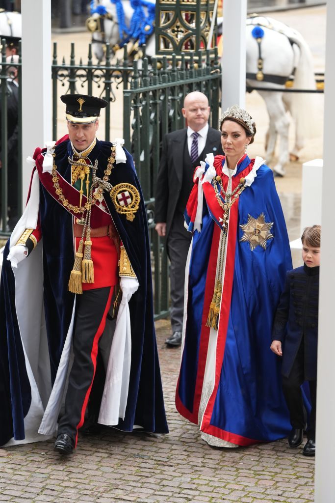 LONDON, ENGLAND - MAY 06: Prince William, Prince of Wales and Catherine, Princess of Wales with Prince Louis arrive ahead of the Coronation of King Charles III and Queen Camilla on May 6, 2023 in London, England. The Coronation of Charles III and his wife, Camilla, as King and Queen of the United Kingdom of Great Britain and Northern Ireland, and the other Commonwealth realms takes place at Westminster Abbey today. Charles acceded to the throne on 8 September 2022, upon the death of his mother, Elizabeth II