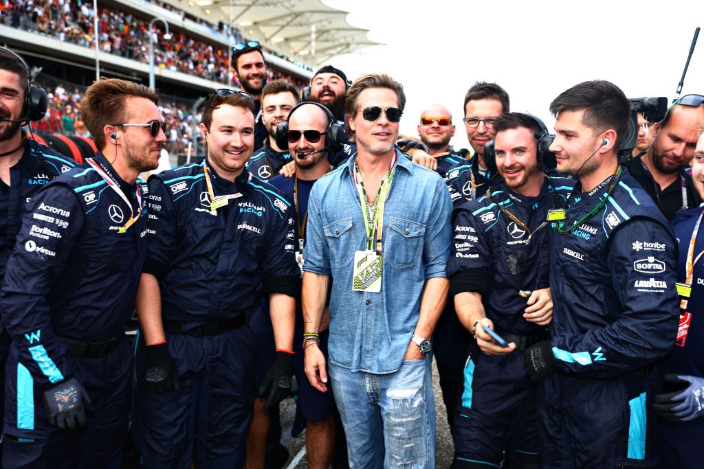 AUSTIN, TEXAS - OCTOBER 23: Brad Pitt poses for a photo with the Williams team during the F1 Grand Prix of USA at Circuit of The Americas on October 23, 2022 in Austin, Texas. (Photo by Dan Istitene - Formula 1/Formula 1 via Getty Images)