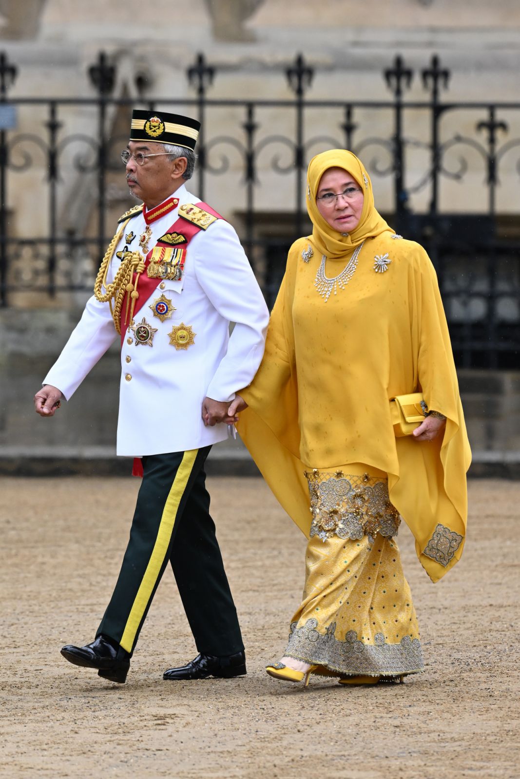 LONDON, ENGLAND - MAY 06: His Majesty Yang di-Pertuan Agong Al-Sultan Abdullah Ri'ayatuddin Al-Mustafa Billah Shah of Malaysia and Her Majesty Raja Permaisuri Agong Tunku Hajah Azizah Aminah Maimunah Iskandariah of Malaysia attend the Coronation of King Charles III and Queen Camilla on May 06, 2023 in London, England. The Coronation of Charles III and his wife, Camilla, as King and Queen of the United Kingdom of Great Britain and Northern Ireland, and the other Commonwealth realms takes place at Westminster