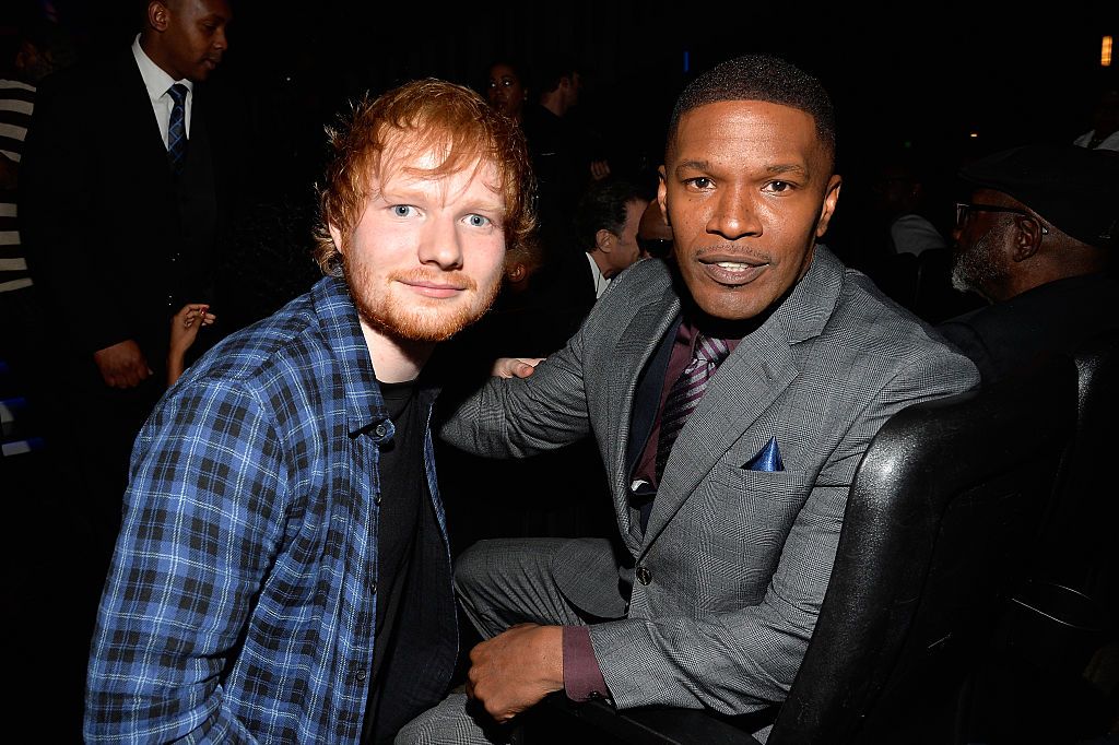 LOS ANGELES, CA - FEBRUARY 10: Recording artist Ed Sheeran (L) and actor Jamie Foxx attend Stevie Wonder: Songs In The Key Of Life - An All-Star GRAMMY Salute at Nokia Theatre L.A. Live on February 10, 2015 in Los Angeles, California. (Photo by Lester Cohen/WireImage)