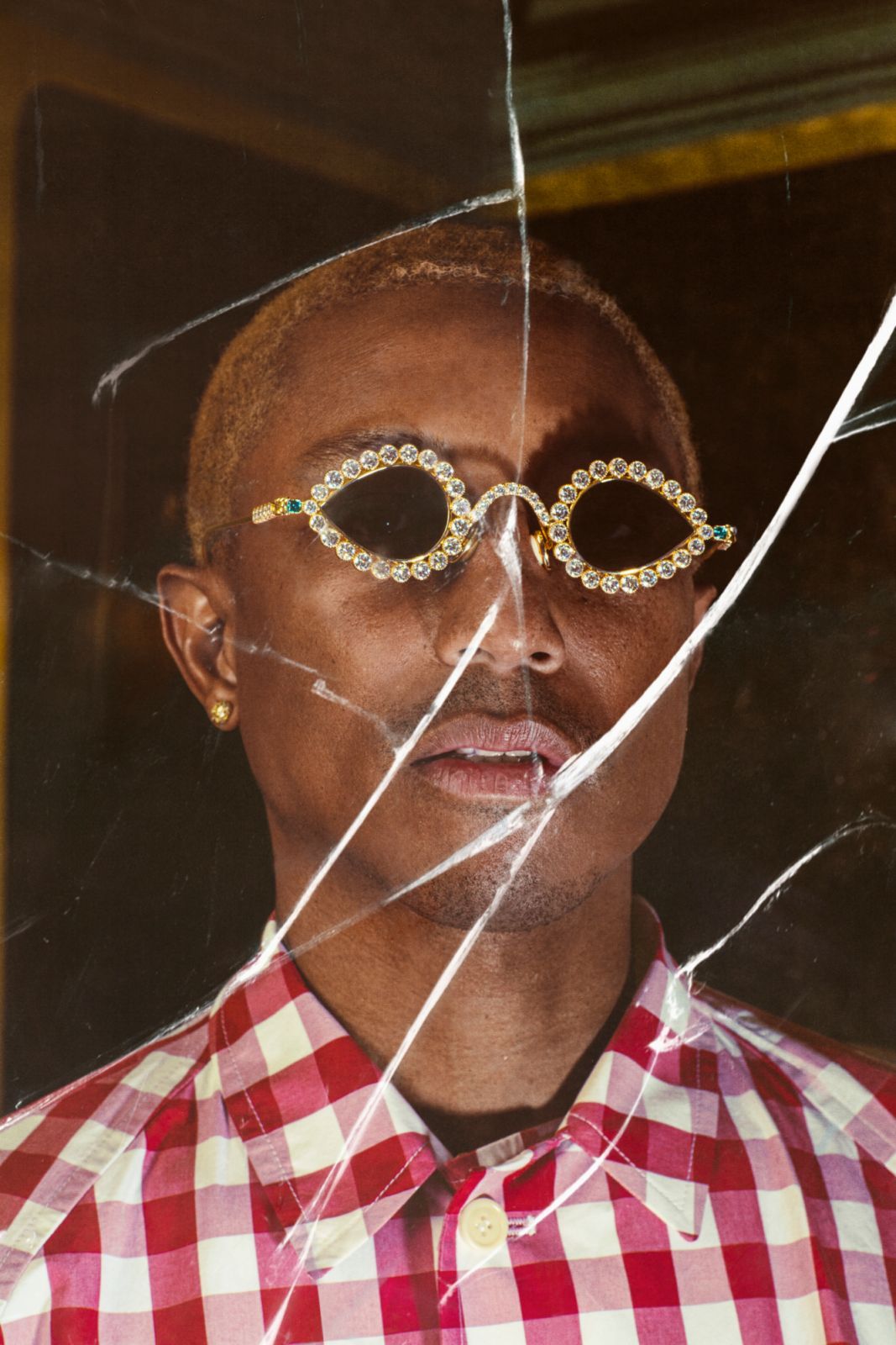 夾克by Prada;珠寶、手錶、太陽眼鏡皆為 Pharrell 私物。(Photo: Lou Escobar for Tatler Hong Kong)