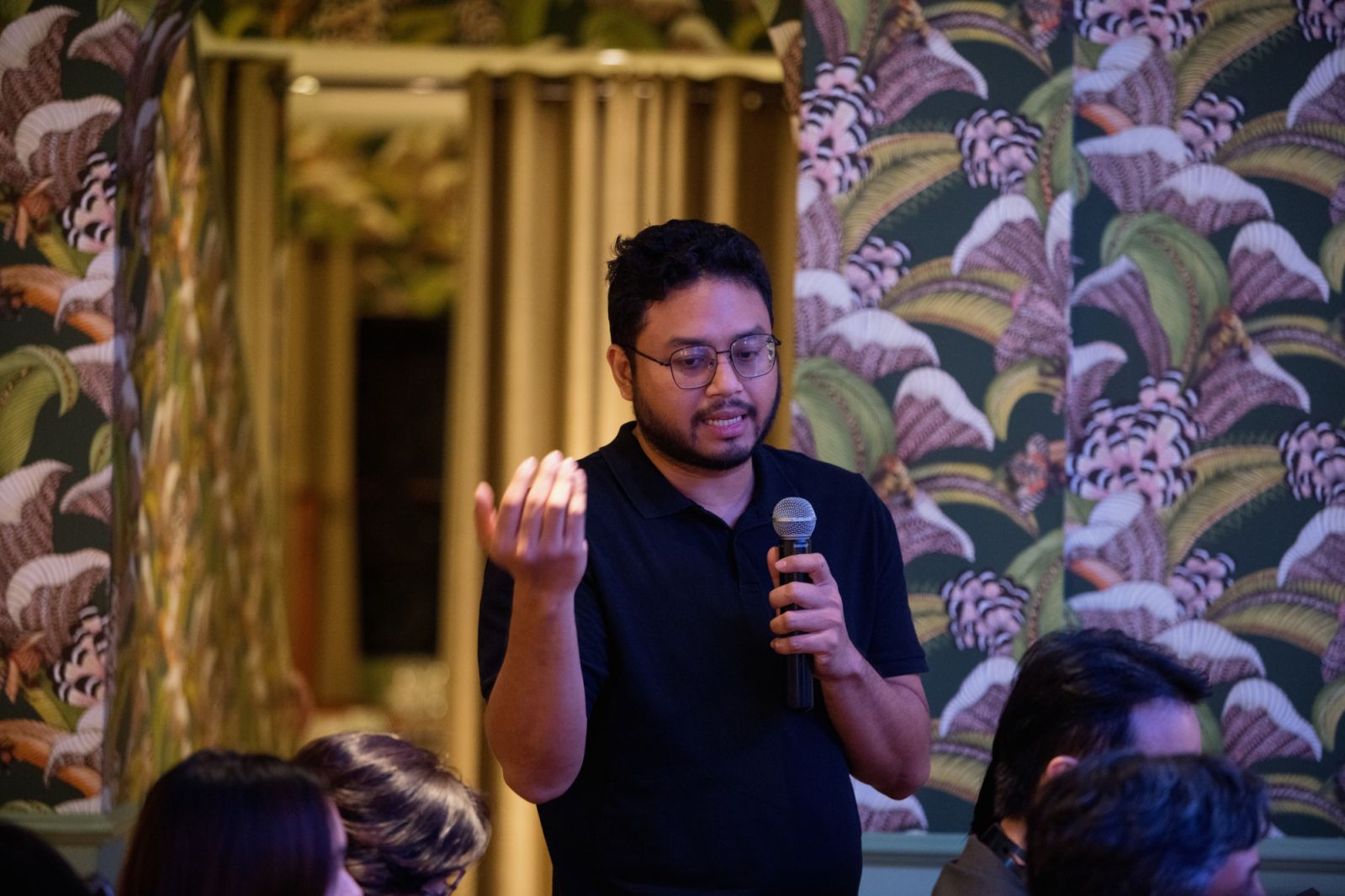 Harith Ridzuan asking a question during the panel