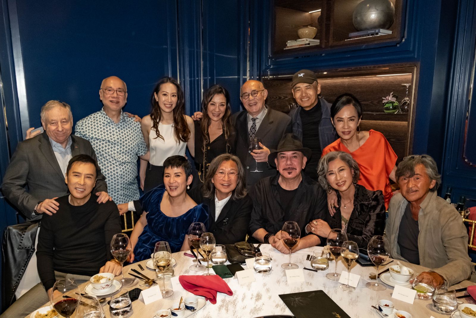 HONG KONG, CHINA - APRIL 14: Jean Todt, Peter Pau, Cissy Wang, Michelle Yeoh, John Shum, Chow Yun Fat, Jasmine Chow, Donnie Yen, Sandra Ng, Peter Chan, Anthony Wong, Sally Yeh and George Lam at the Mandarin Oriental, Hong Kong on April 14, 2023 in Hong Kong, China. (Photo by Keith Tsuji/Getty Images for Mandarin Oriental, Hong Kong)