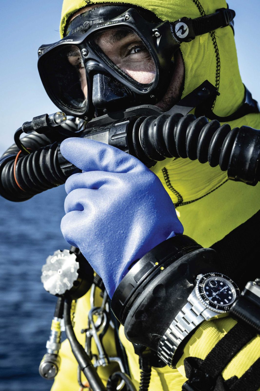 The Pole co- director Ghislain Bardout wearing his Rolex watch and a rebreather as he prepares to dive into the Arctic waters of Svalbard Archipelago