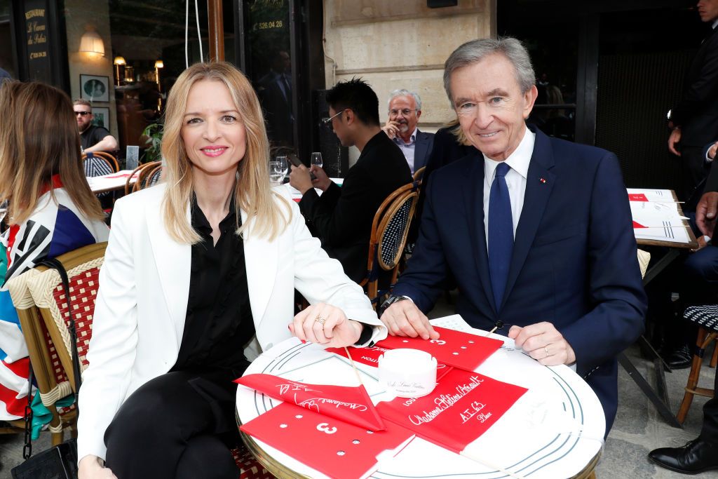 PARIS, FRANCE - JUNE 20: Louis Vuitton's executive vice president Delphine Arnault and Owner of LVMH Luxury Group Bernard Arnault attend the Louis Vuitton Menswear Spring Summer 2020 show as part of Paris Fashion Week on June 20, 2019 in Paris, France. (Photo by Bertrand Rindoff Petroff/Getty Images)