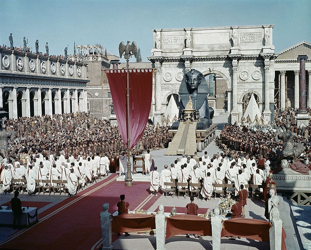 Actress Elizabeth Taylor (1932 - 2011) stars as the titular Egyptian monarch in the 20th Century Fox film 'Cleopatra', 1963. Here she arrives in Rome, amidst great pomp and splendour. (Photo by Archive Photos/Getty Images)