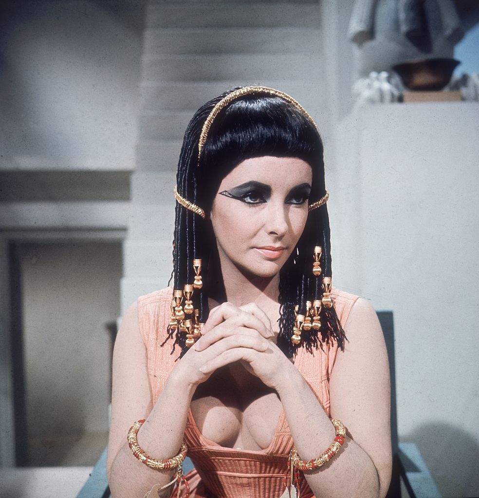 1963: British-born actress Elizabeth Taylor presents a majestic front as the Egyptian queen in 20th Century Fox's 'Cleopatra', directed by Joseph L Mankiewicz. (Photo by Hulton Archive/Getty Images)