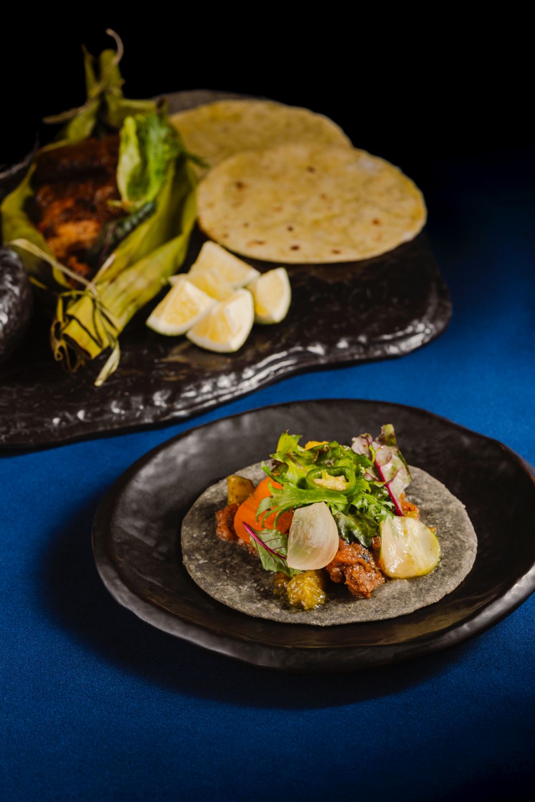 Family-style eating Alegria MNL taco.2