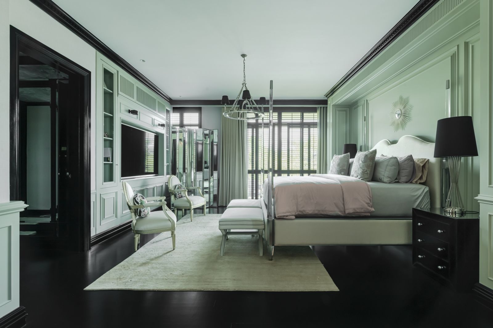 The masterbedroom is a sophisticated mix of furniture