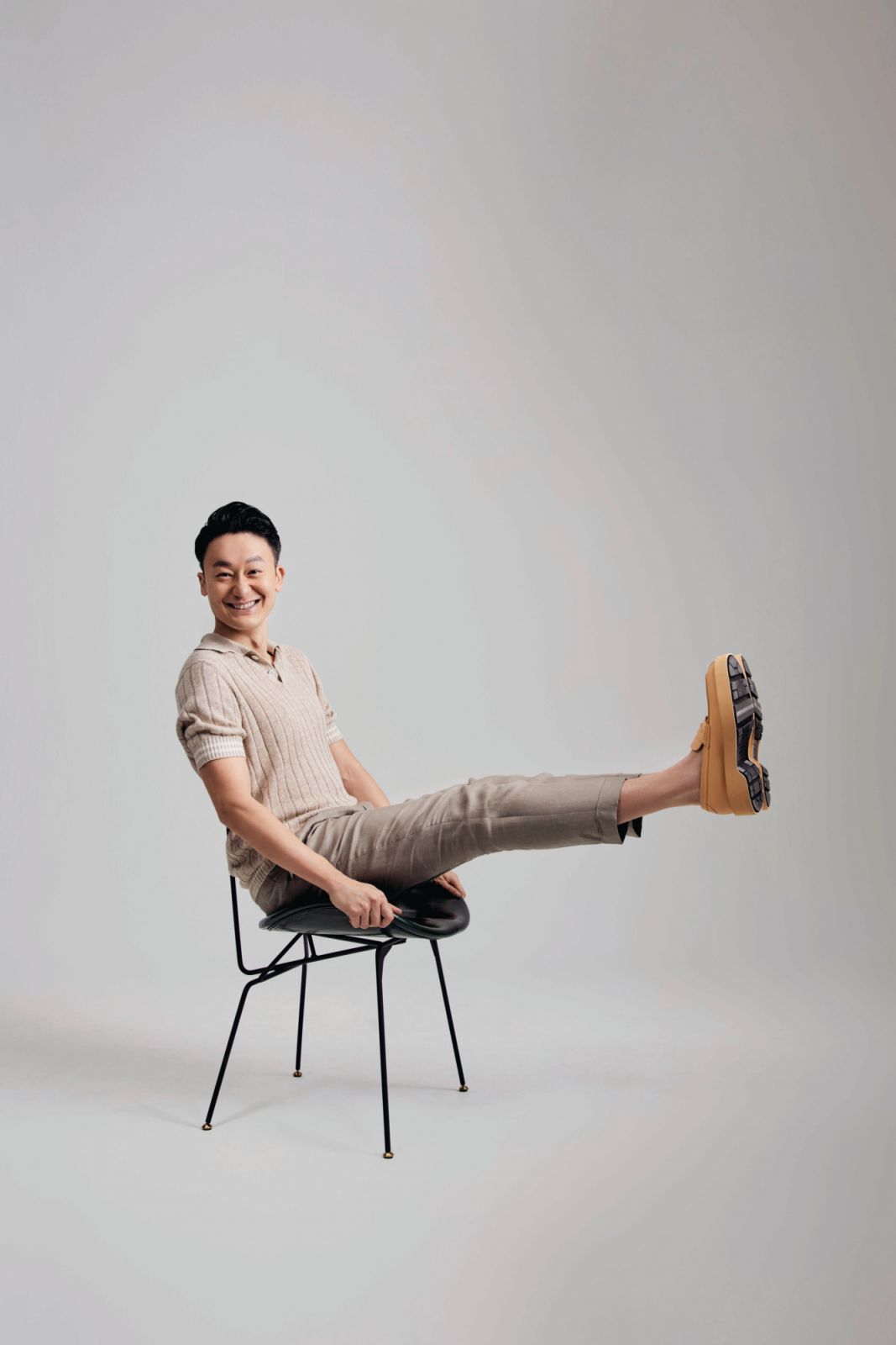 Bruno Cucinelli polo, trousers; Zegna loafers (Photo: Tatler Hong Kong / Affa Chan)
