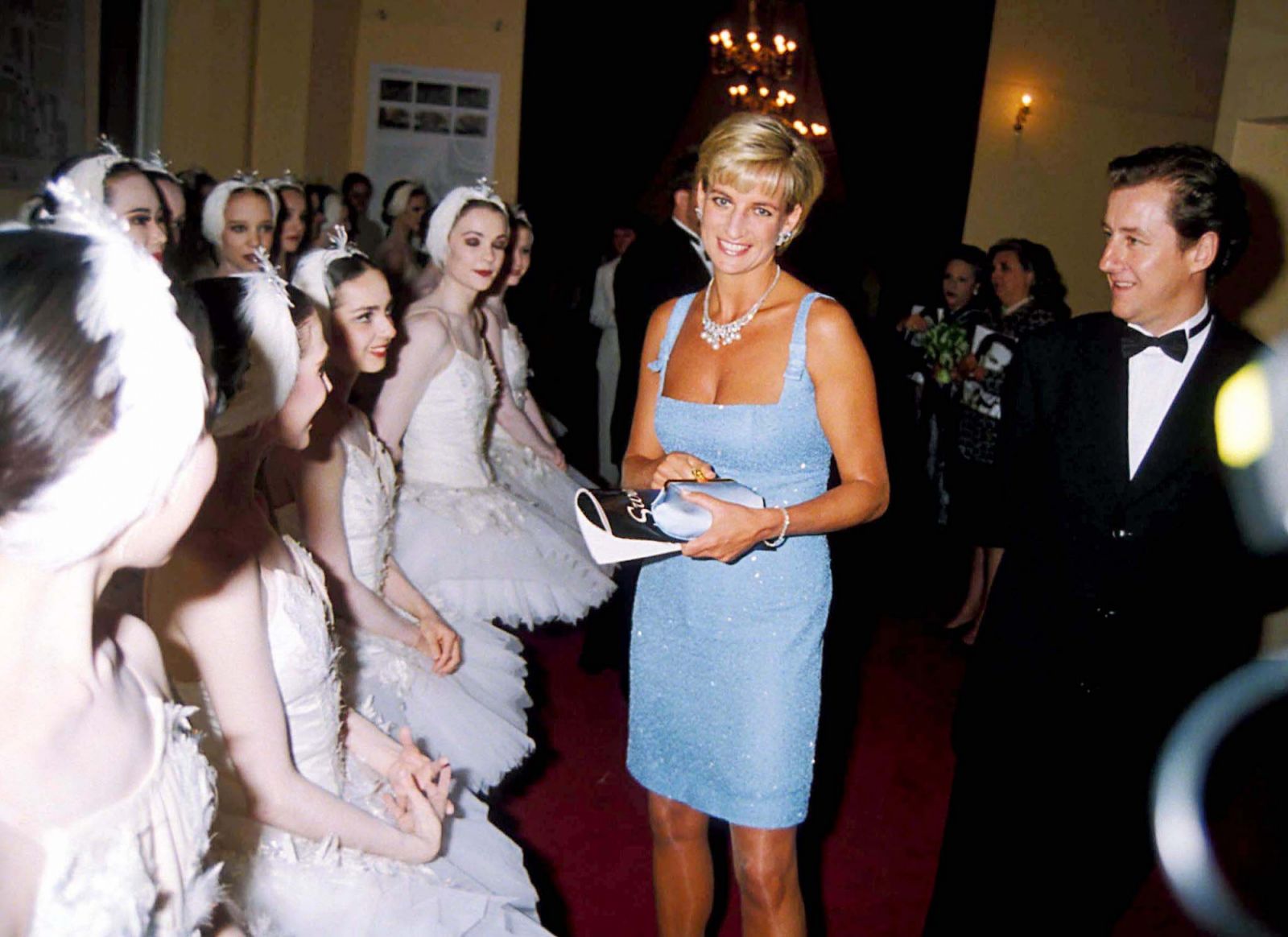 LONDON, UNITED KINGDOM - JUNE 03: Diana, Princess Of Wales As Patron Of The English National Ballet, Attends Their Royal Gala Performance Of 'swan Lake' At London's Royal Albert Hall. Walking Behind Is Her Lady-in-waiting Anne Beckwith-smith. The Princess Is Wearing A Stunning Ice Blue Beaded Evening Shift Dress Designed By Jacques Azagury With A Diamond And Pearl Necklace Loaned By Garrard The Jewellers. (Photo by Tim Graham Photo Library via Getty Images)