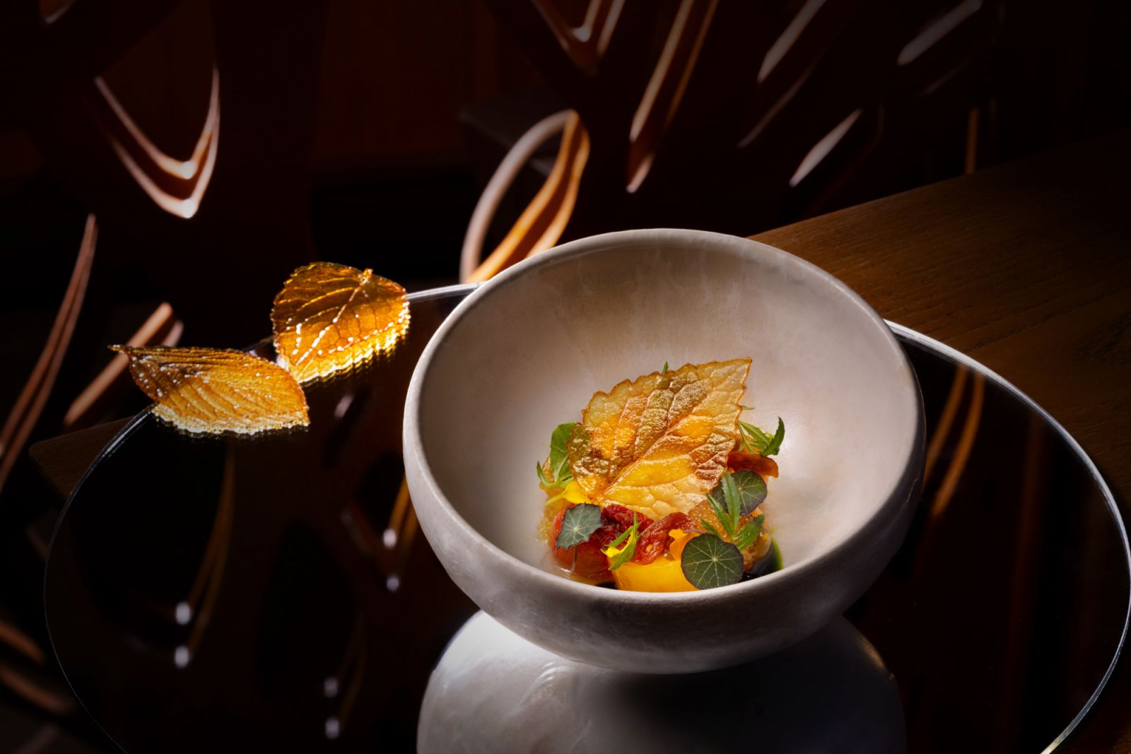 Maiden cherry tomato with oyster, smoked pike perch roe, Zen Farm marigold