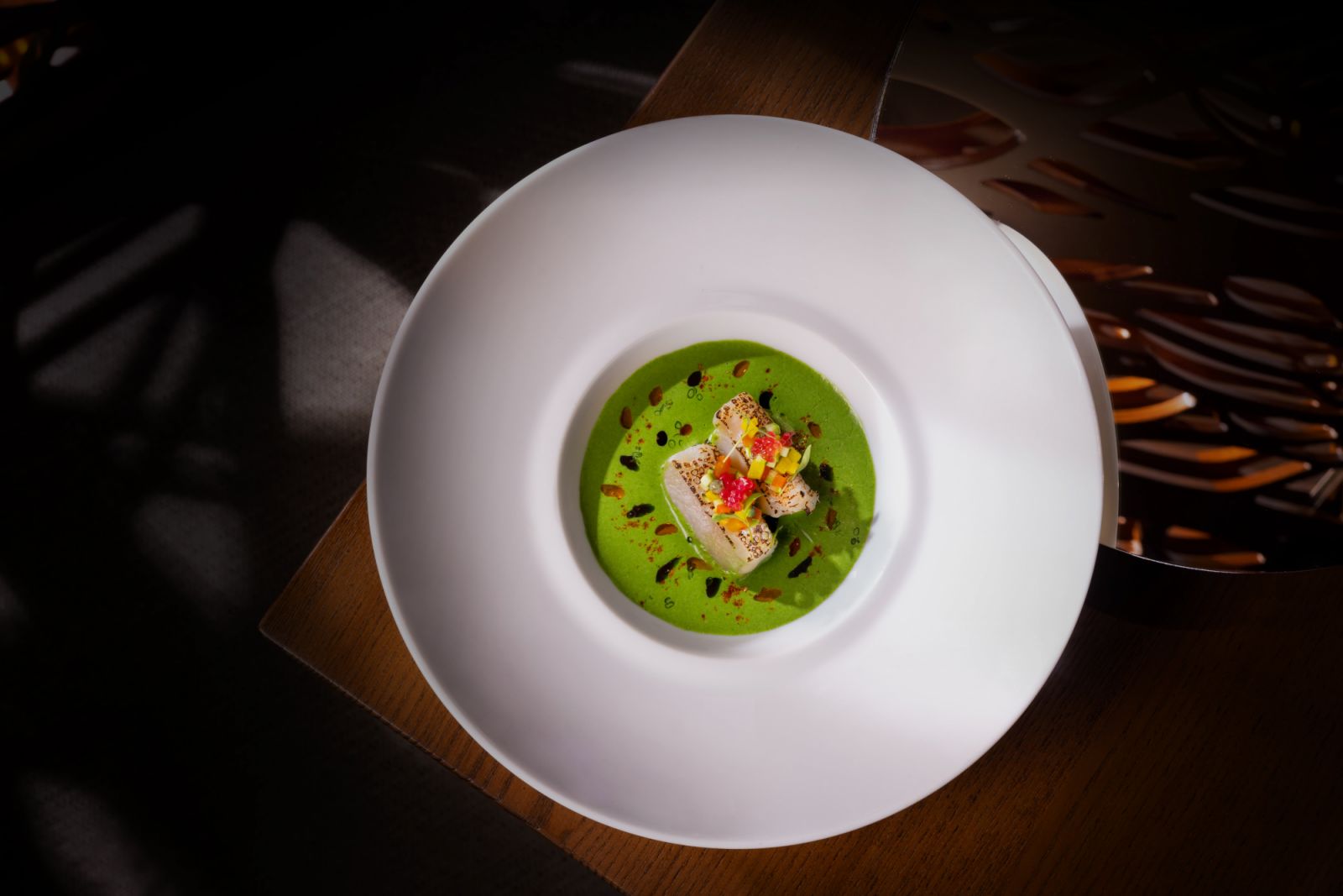 Torched Hokkaido scallops, coriander and coconut cream, courgette and finger lime