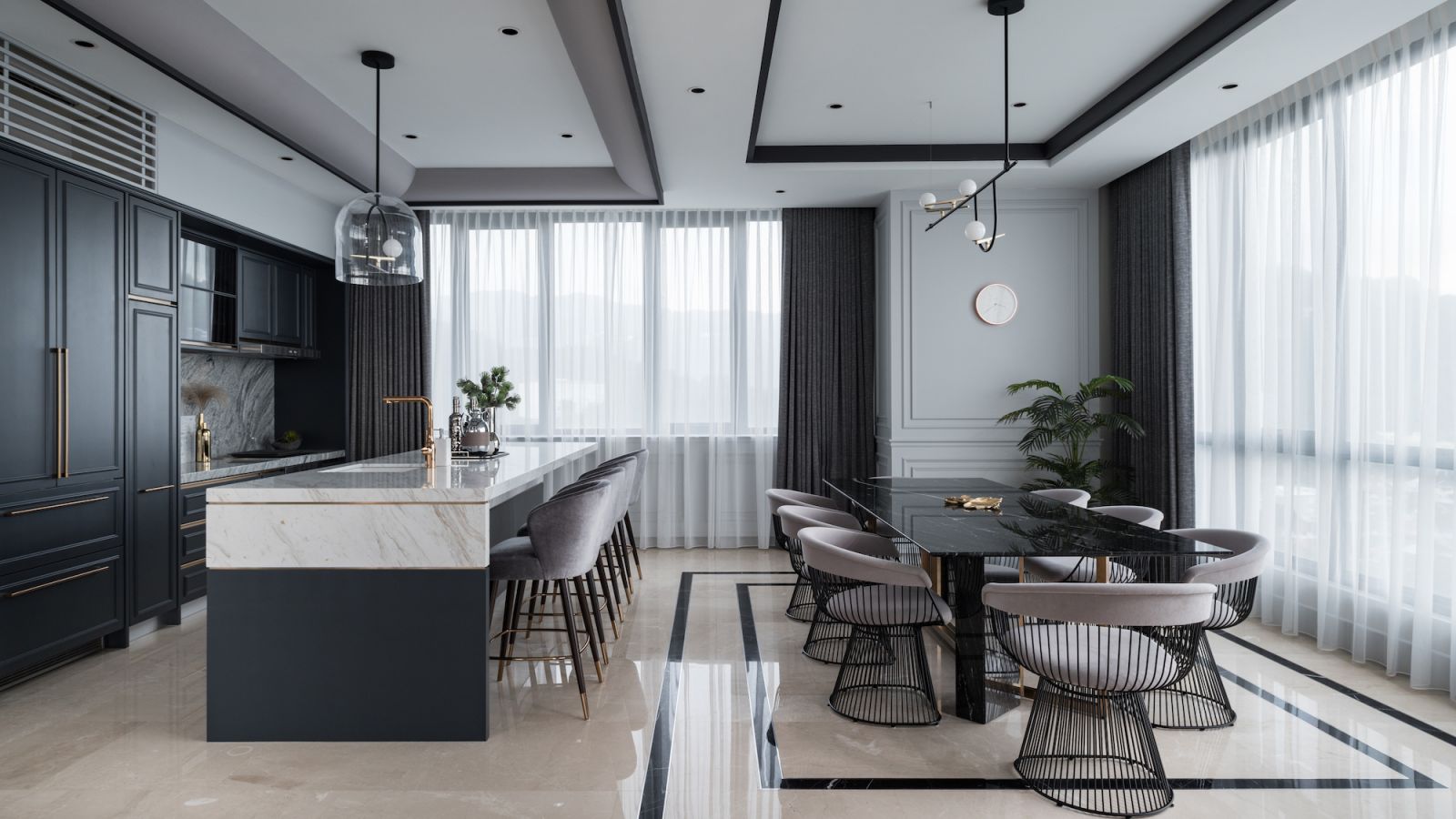 Dark cabinetry contrasts well against the shades of gray