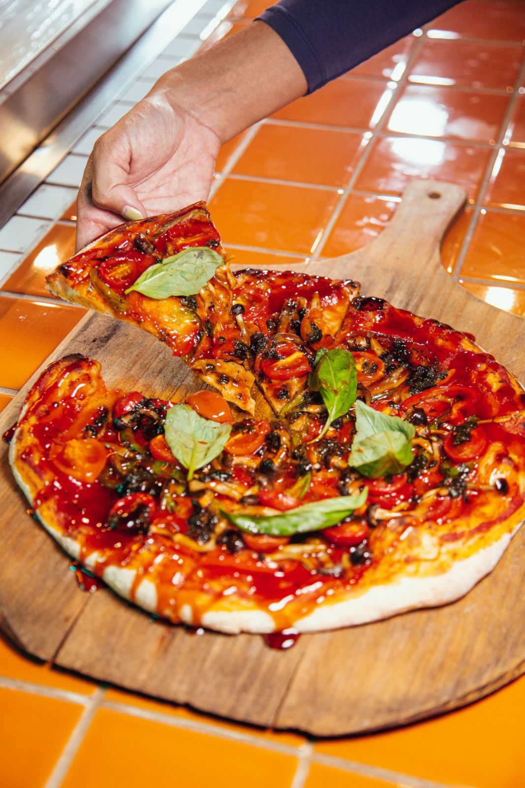 Lingham's hot sauce pizza by Phil's Pizza