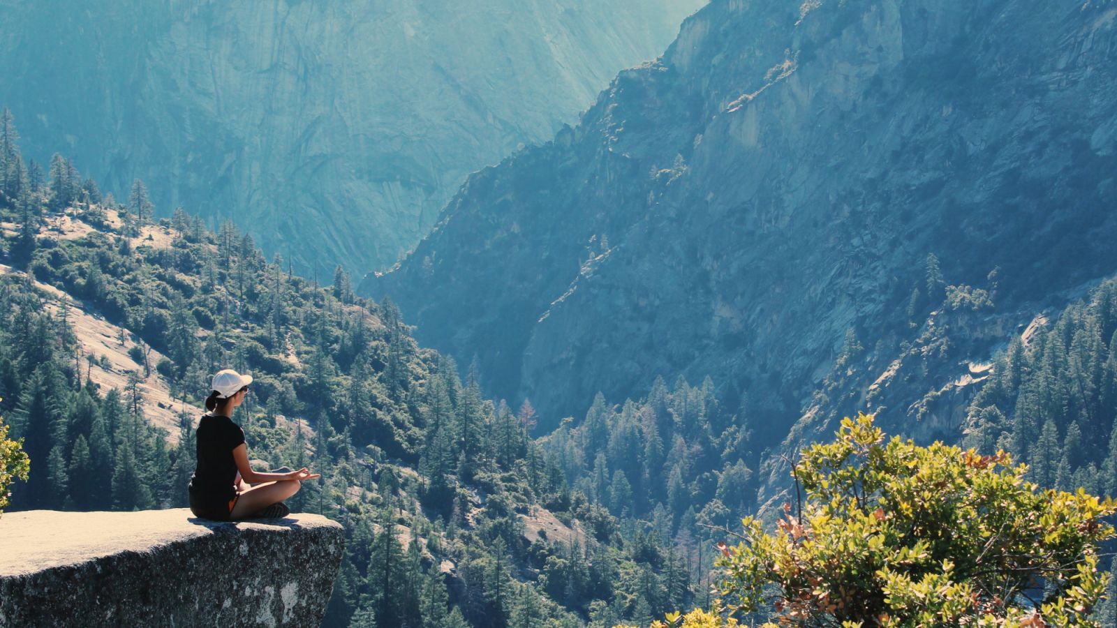 A woman meditating in nature (Photo: Noelle Otto / Pexels)