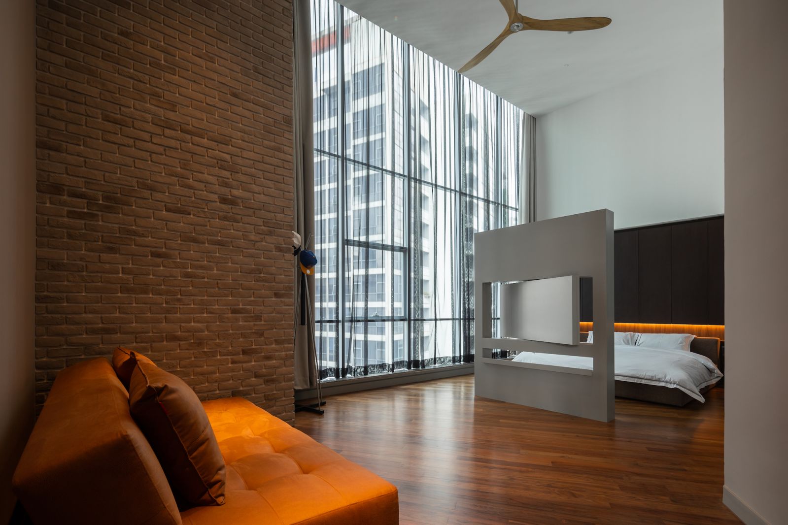 Exposed brickwork warms the space