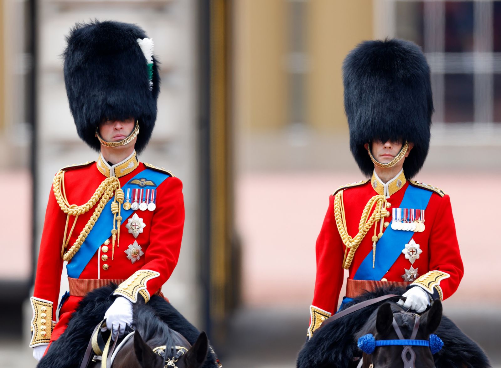 LONDON, UNITED KINGDOM - JUNE 17: (EMBARGOED FOR PUBLICATION IN UK NEWSPAPERS UNTIL 24 HOURS AFTER CREATE DATE AND TIME) Prince William, Prince of Wales (Colonel of the Welsh Guards) (L) and Prince Edward, Duke of Edinburgh (Colonel of The London Guards) (R) watch a march past outside Buckingham Palace after attending Trooping the Colour on June 17, 2023 in London, England. Trooping the Colour is a traditional military parade held at Horse Guards Parade to mark the British Sovereign's official birthday. It