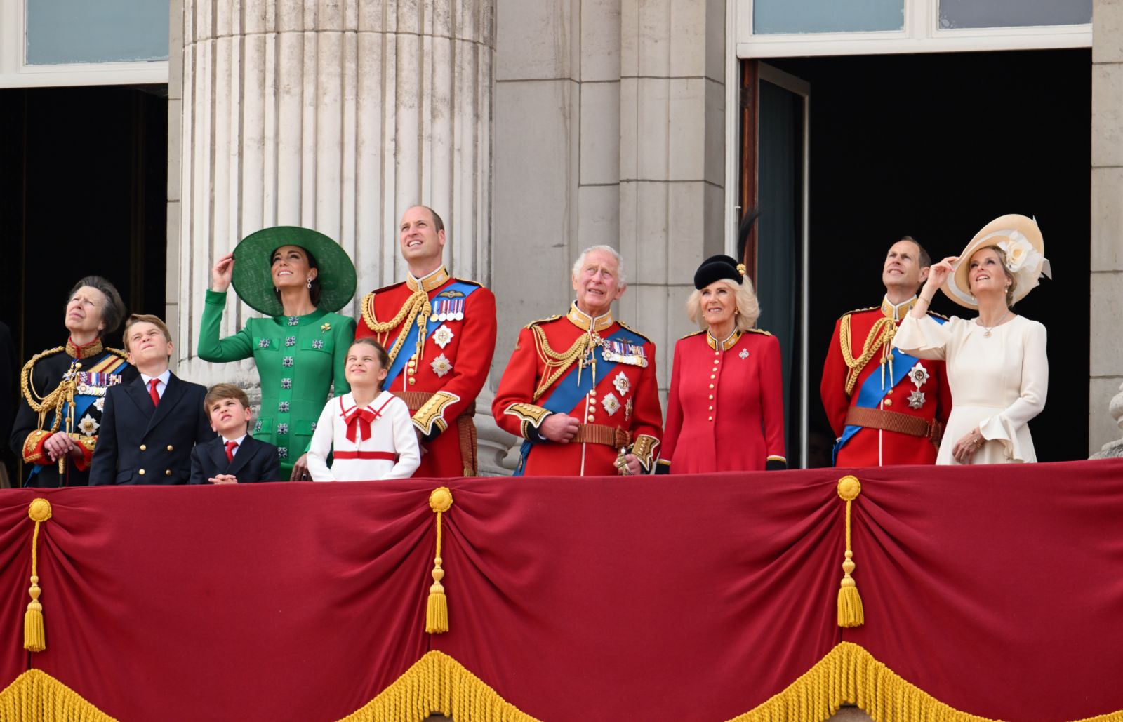 The royals standing on the balcony of Buckingham Palace to watch a fly-past of aircraft by the Royal Air Force during Trooping the Colour