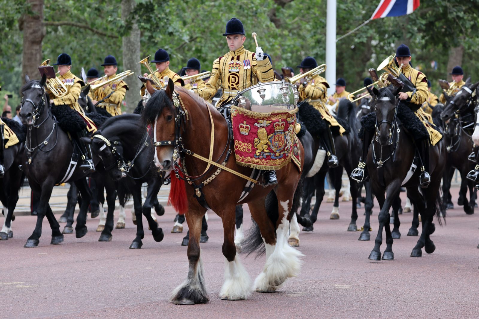 LONDON, ENGLAND - JUNE 17: Members of the band head down The Mall during Trooping the Colour on June 17, 2023 in London, England. Trooping the Colour is a traditional parade held to mark the British Sovereign's official birthday. It will be the first Trooping the Colour held for King Charles III since he ascended to the throne. (Photo by Neil Mockford/Getty Images)