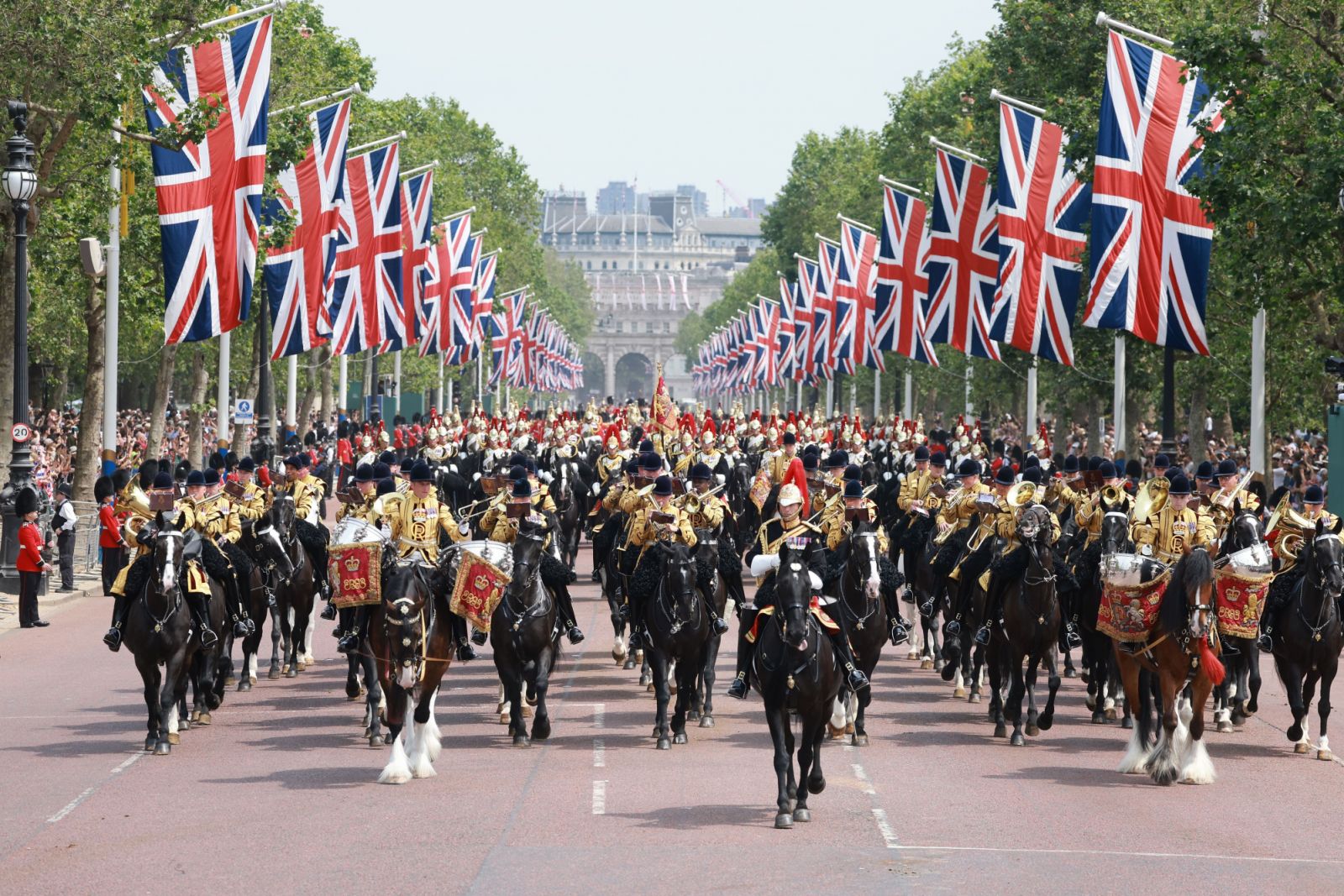 LONDON, ENGLAND - JUNE 17: Troops advance down the Mall during Trooping the Colour on June 17, 2023 in London, England. Trooping the Colour is a traditional parade held to mark the British Sovereign's official birthday. It will be the first Trooping the Colour held for King Charles III since he ascended to the throne. (Photo by Chris Jackson/Getty Images)
