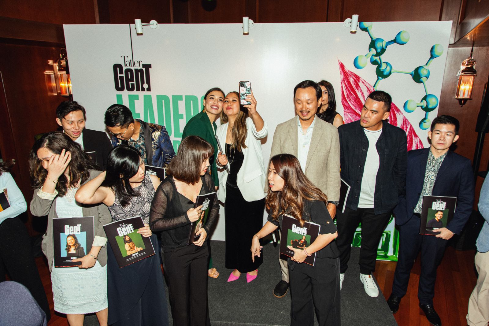 2023 Gen.T honourees mingling with one another after the group photo shoot (Photo: Daniel Adams)