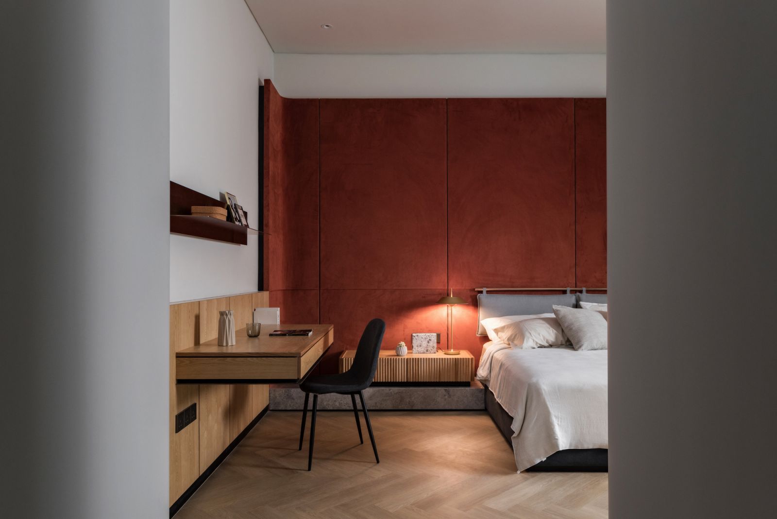 The master bedroom has a bolder colour palette