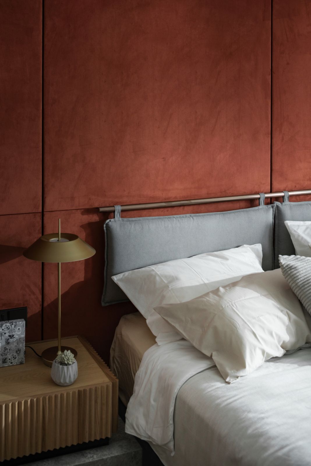 The master bedroom has a bolder colour palette