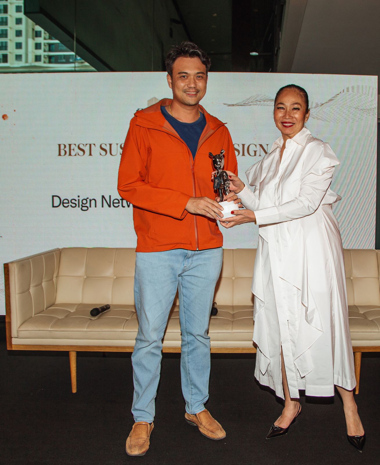 Mervyn Wong of Design Network Architect receiving the award for Best Sustainable Project