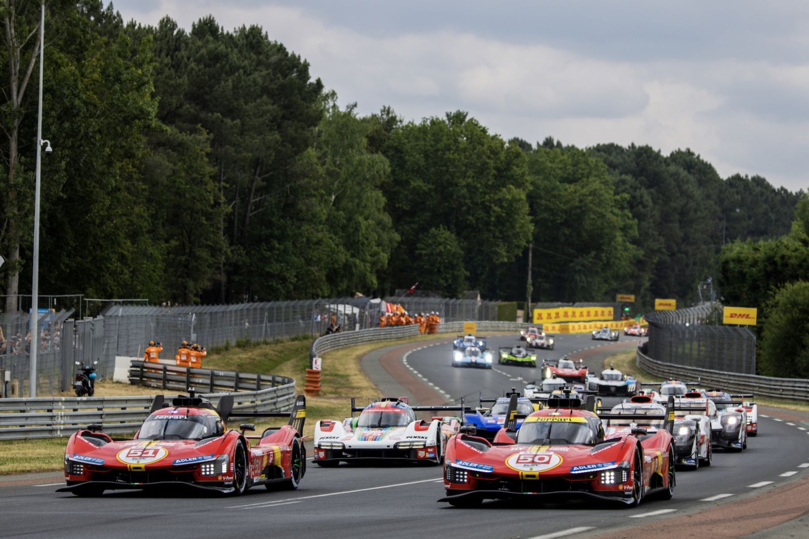 Race start, 51 PIER GUIDI Alessandro (ita), CALADO James (gbr), GIOVINAZZI Antonio (ita), Ferrari AF Corse, Ferrari 499P, 50 FUOCO Antonio (ita), MOLINA Miguel (spa), NIELSEN Nicklas (dnk), Ferrari AF Corse, Ferrari 499P, action during the 24 Hours of Le Mans 2023 on the Circuit des 24 Heures du Mans from June 10 to 11, 2023 in Le Mans, France - Photo Julien Delfosse / DPPI