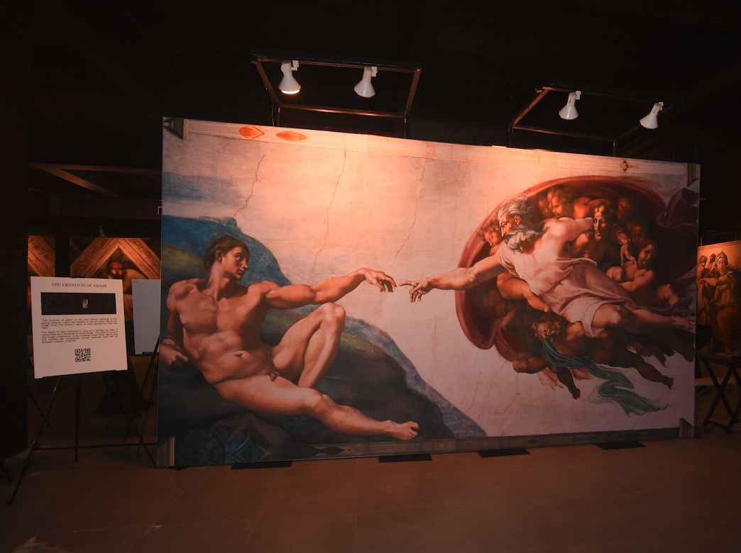 Michelangelo’s “The Creation of Adam” at the Sistine Chapel Exhibition located in Estancia Mall, Capitol Commons