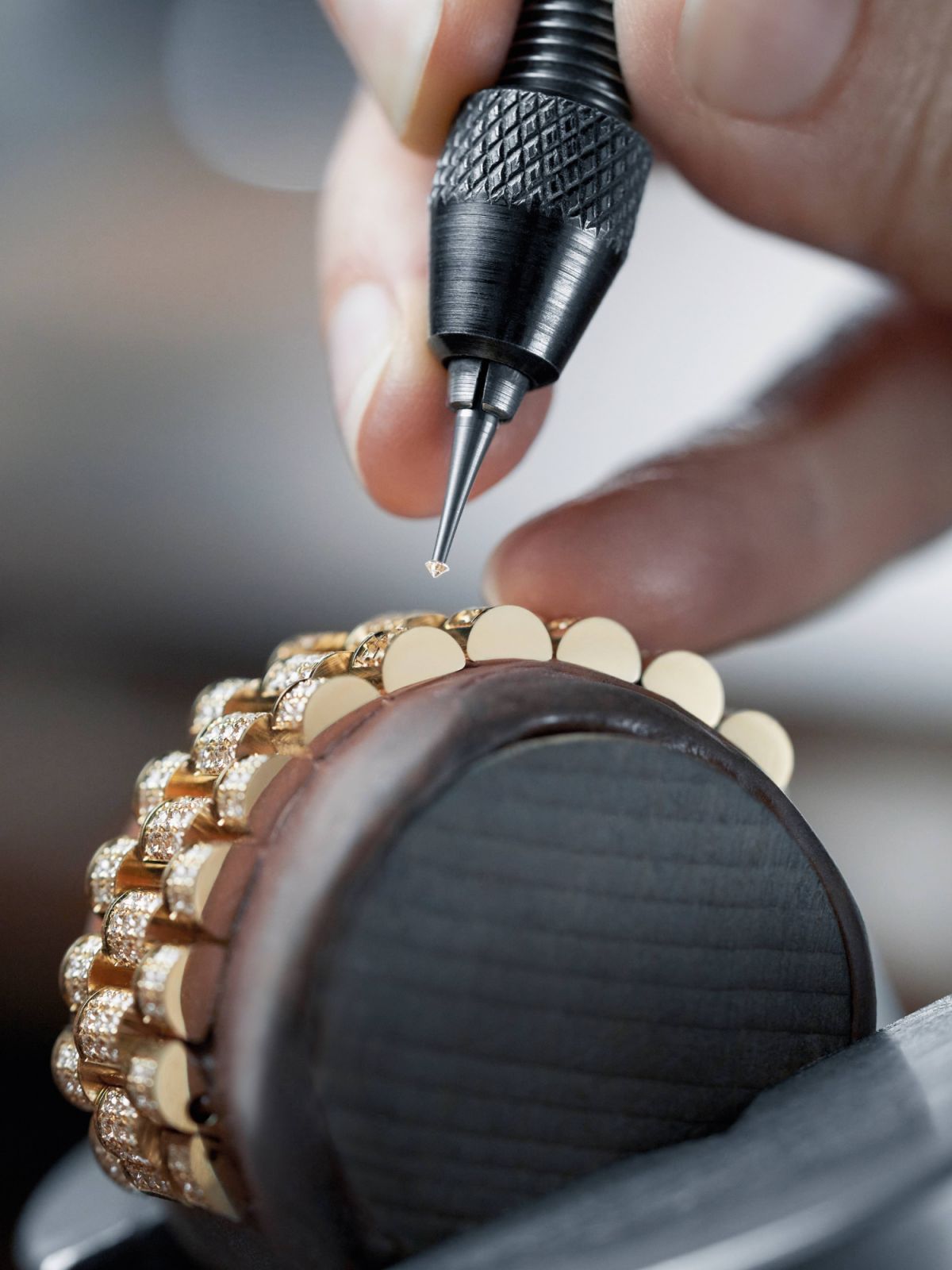 A President bracelet in 18-karat yellow gold being set with gems (Photo: courtesy of Rolex)