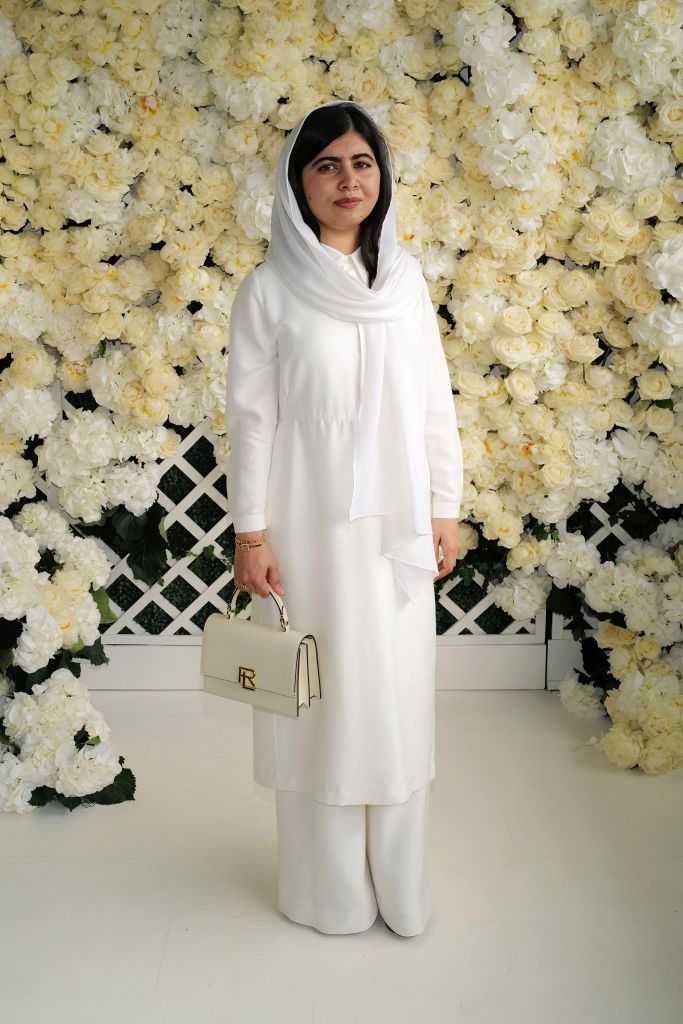 WIMBLEDON, ENGLAND - JULY 09: Malala Yousafzai, wearing Ralph Lauren, attends the Polo Ralph Lauren & British Vogue event during The Championships, Wimbledon at All England Lawn Tennis and Croquet Club on July 09, 2023 in Wimbledon, England. (Photo by Darren Gerrish/WireImage)