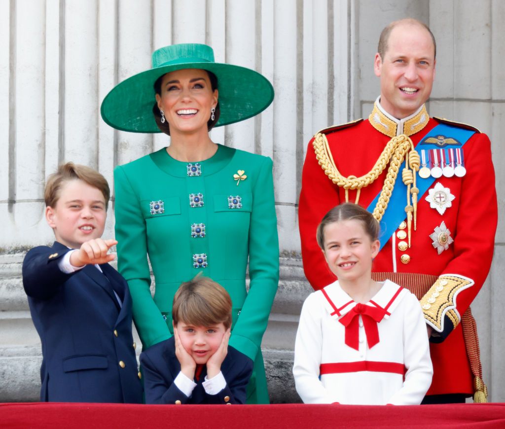 LONDON, UNITED KINGDOM - JUNE 17: (EMBARGOED FOR PUBLICATION IN UK NEWSPAPERS UNTIL 24 HOURS AFTER CREATE DATE AND TIME) Prince George of Wales, Prince Louis of Wales, Catherine, Princess of Wales (Colonel of the Irish Guards), Princess Charlotte of Wales and Prince William, Prince of Wales (Colonel of the Welsh Guards) watch an RAF flypast from the balcony of Buckingham Palace during Trooping the Colour on June 17, 2023 in London, England. Trooping the Colour is a traditional military parade held at Horse