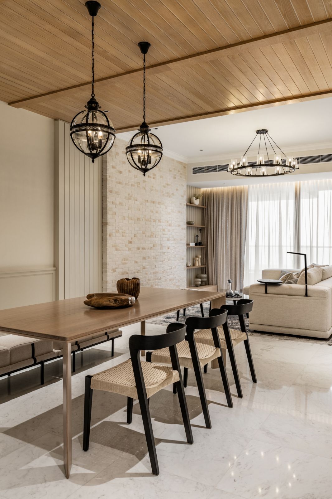 The custom oversized table is made from solid oak