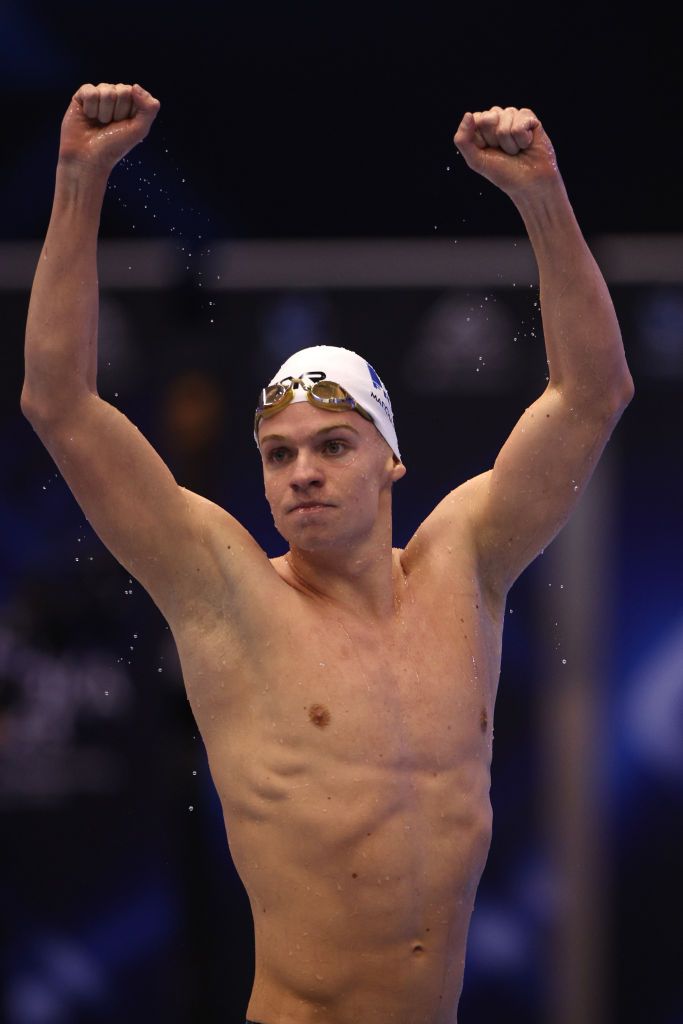 FUKUOKA, JAPAN - JULY 23: Leon Marchand of Team France celebrates winning gold in the Men's 400m Individual Medley Final in a new world record time of WR 4:02.50 on day one of the Fukuoka 2023 World Aquatics Championships at Marine Messe Fukuoka Hall A on July 23, 2023 in Fukuoka, Japan. (Photo by Adam Pretty/Getty Images)