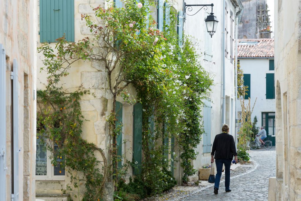 ILE DE RE, FRANCE - SEPTEMBER 12: Typical street scene quaint house with shutters traditional architecture on September 12, 2015 in St Martin de Re, Ile de Re, France. (Photo by Tim Graham/Getty Images)
