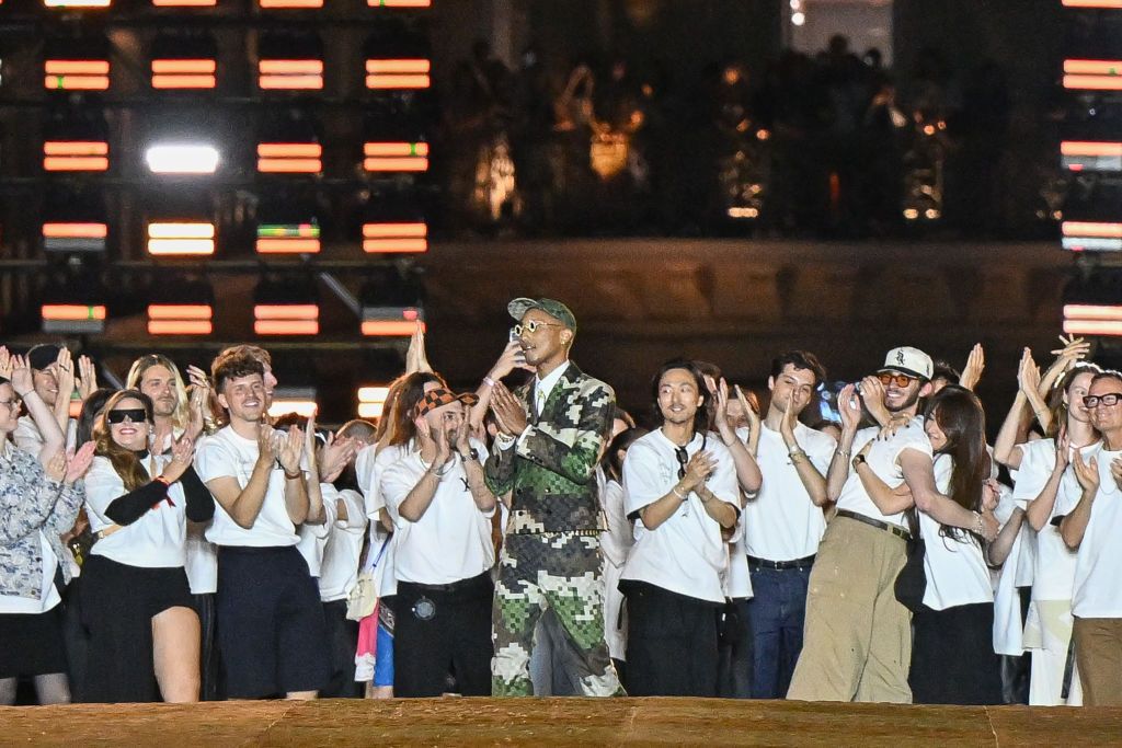 PARIS, FRANCE - JUNE 20: (EDITORIAL USE ONLY - For Non-Editorial use please seek approval from Fashion House) Fashion designer Pharrell Williams (C) walk the runway during the Louis Vuitton Menswear Spring/Summer 2024 show as part of Paris Fashion Week on June 20, 2023 in Paris, France. (Photo by Stephane Cardinale - Corbis/Corbis via Getty Images)