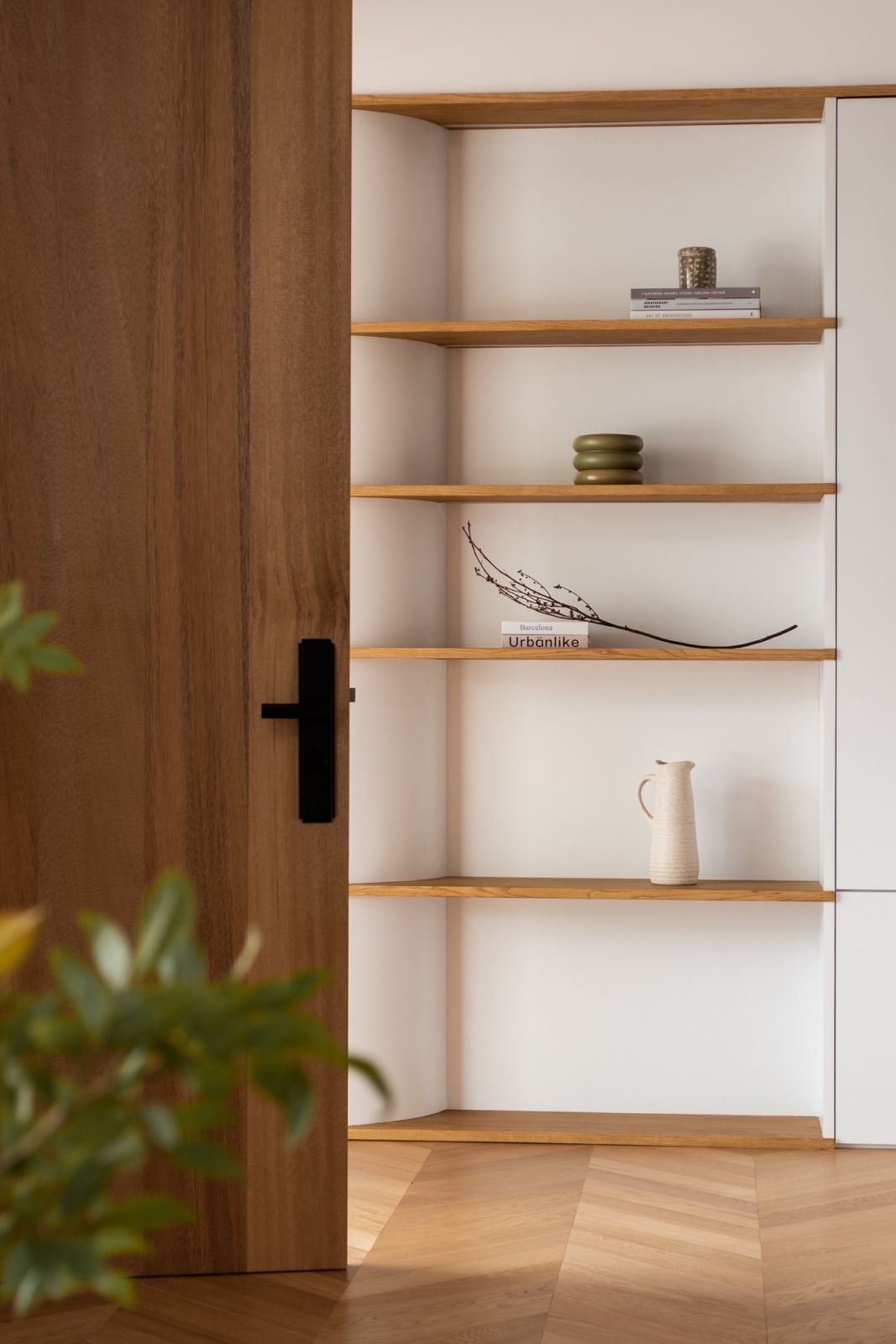 The meticulously detailed shelving in the foyer