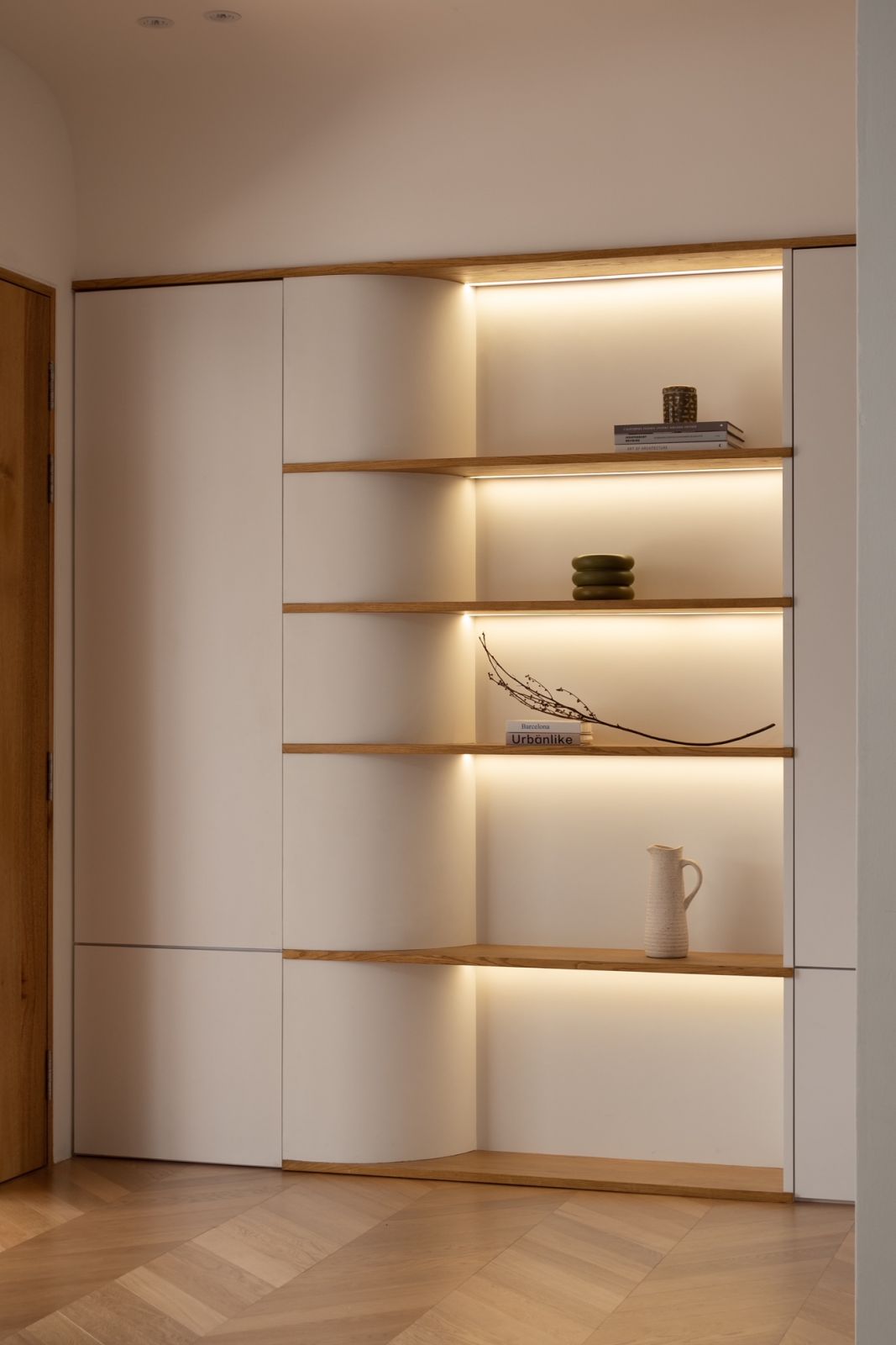 The meticulously detailed shelving in the foyer