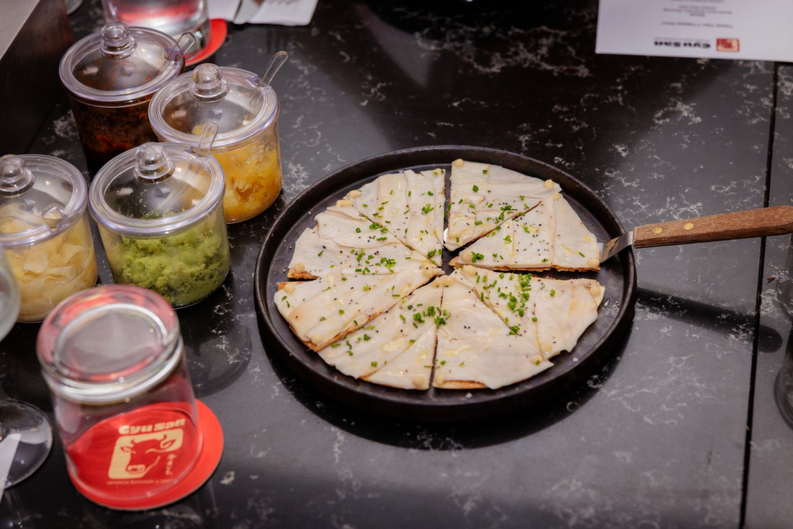Kicking dinner off with a mushroom pizza starter (Photo: Adrian Lee)